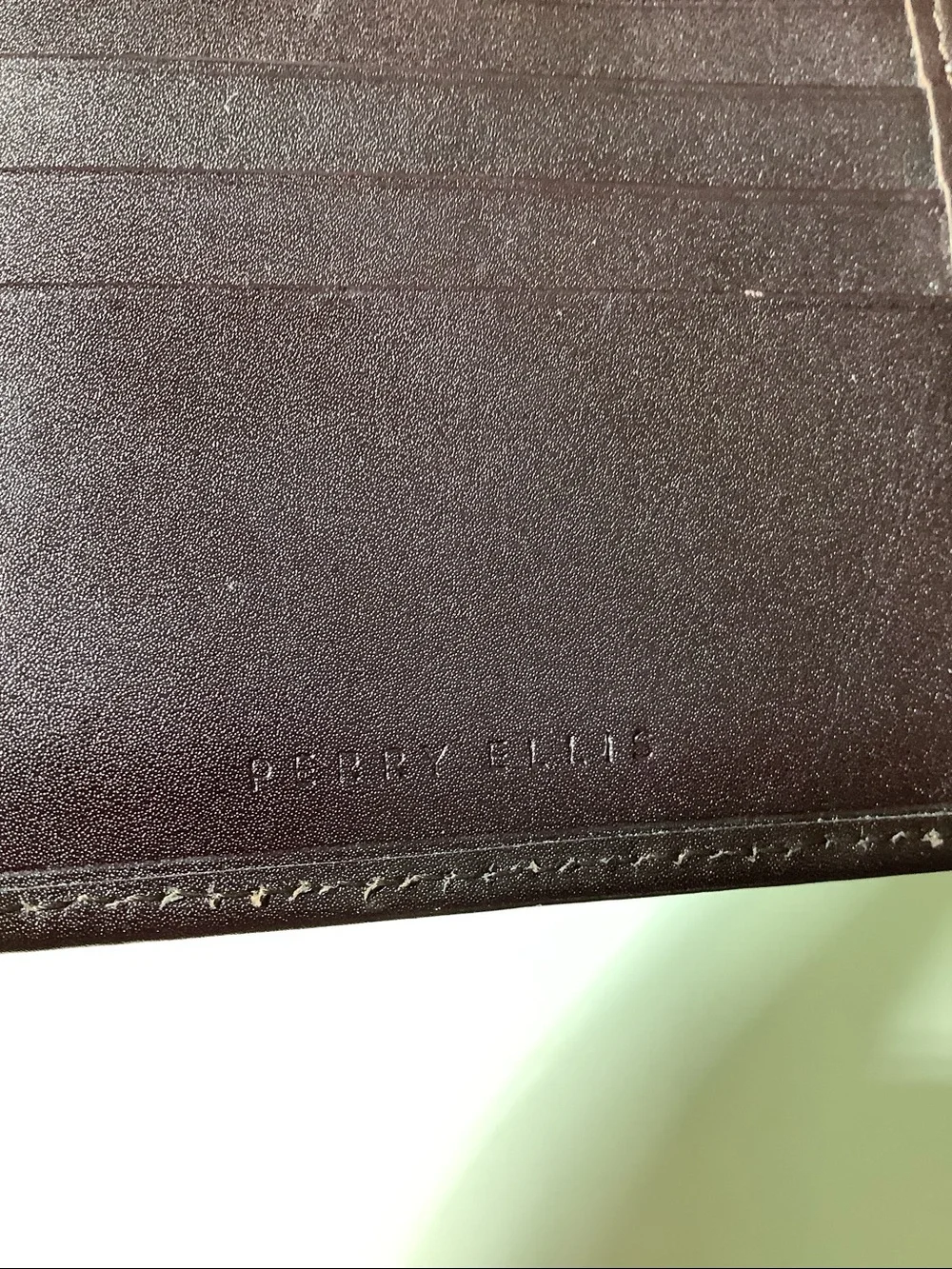 Perry Ellis brown leather bi-fold wallet